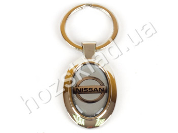Брелок металевий з силіконовою наклейкою "NISSAN" 84386